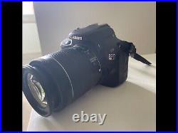 Canon EOS 100D 18.0 MP Digital SLR Camera Black (Kit with EF-S 18-55mm IS STM)