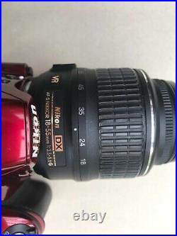 Nikon d3200 digital camera with 18-55 mm lens, red colour